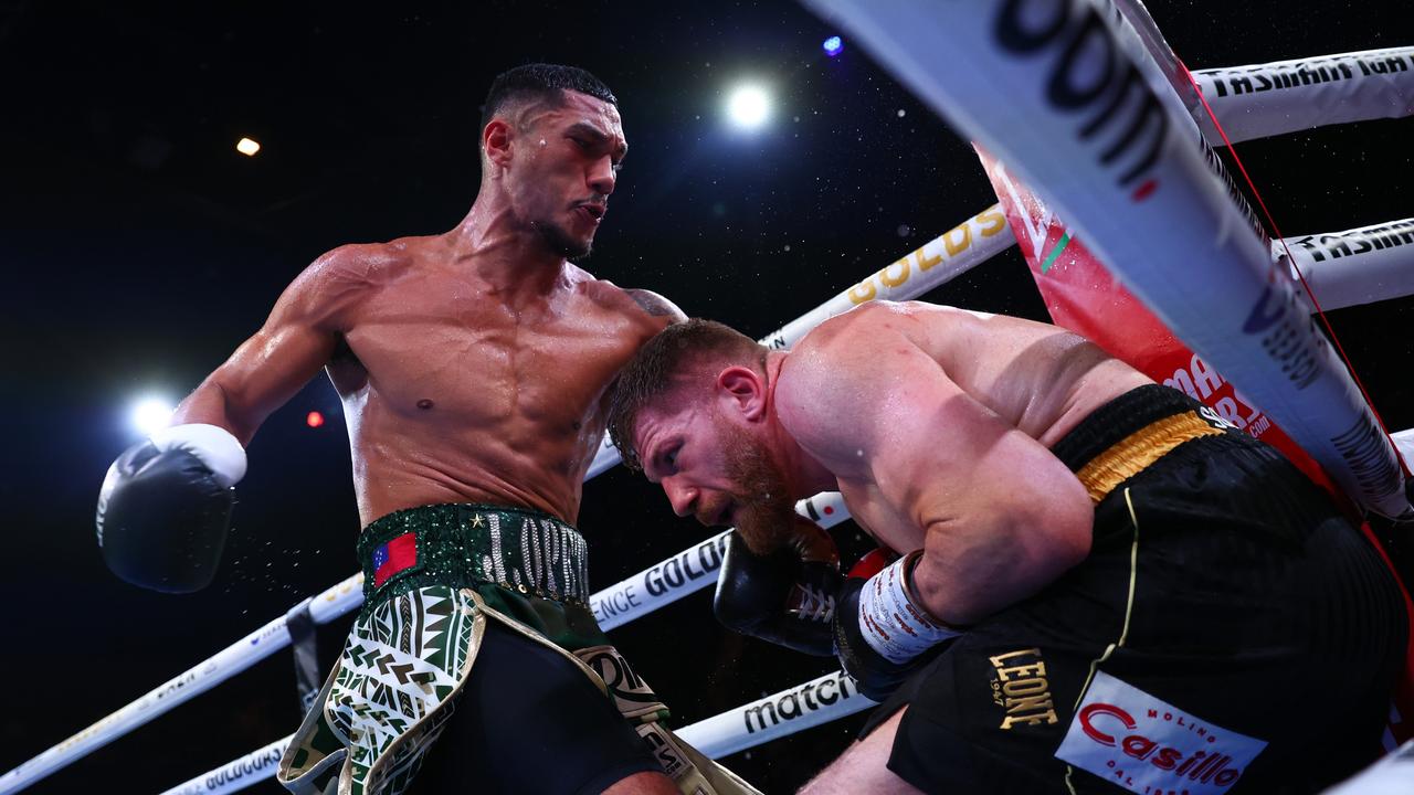 Jai Opetaia (L) of Australia punches Claudio Squeo of Italy during their IBF Cruiserweight Title bout. (Photo by Chris Hyde/Getty Images) *** BESTPIX ***
