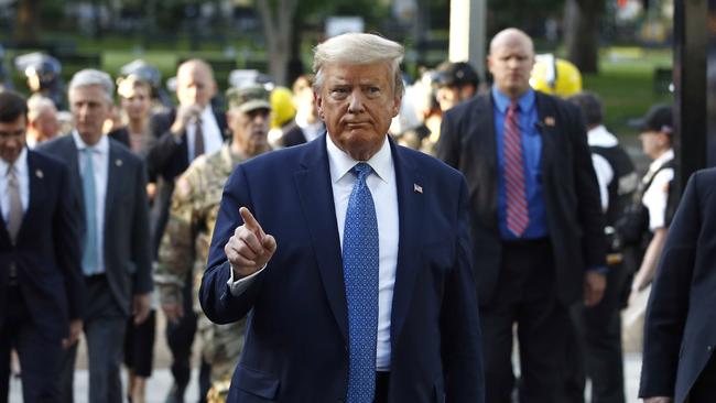 President Donald Trump returns to the White House after visiting outside St John's Church. Picture: AP