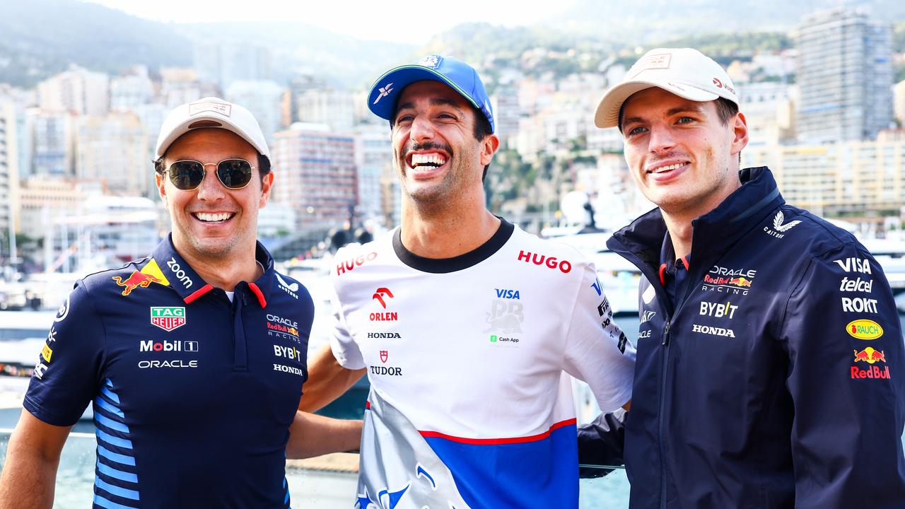 Perez with Daniel Ricciardo and Max Verstappen. (Photo by Mark Thompson/Getty Images)