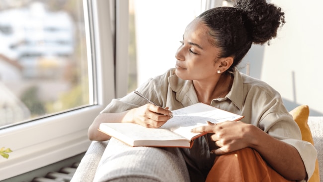 We have to create stillness to hear the quiet whispers of our wisdom – through things like walks in nature or doing some journalling. Image: iStock