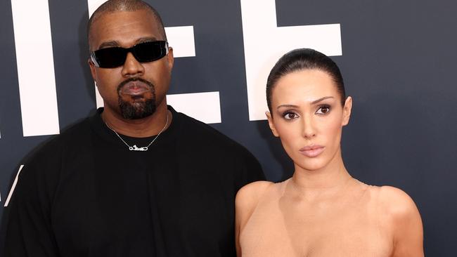 PIXELATED VERSIONS -  LOS ANGELES, CALIFORNIA - FEBRUARY 02: (EDITOR'S NOTE: Image contains nudity.) L-R, Kanye West and Bianca Censori attend the 67th Annual GRAMMY Awards on February 02, 2025 in Los Angeles, California.  (Photo by Matt Winkelmeyer/Getty Images for The Recording Academy)