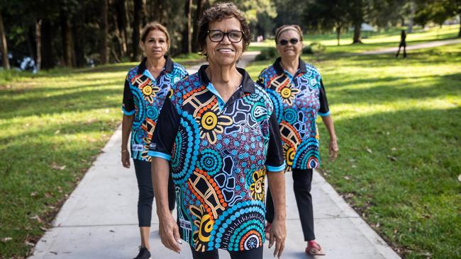 Bev Donovan, centre, with walking mates, Mareen Silleri, right, and Frances Carr. Aunty Bev turned her health around after going back to her home town and taking up walking, going from 185kg to 67kg. Picture: John Feder/The Australian.