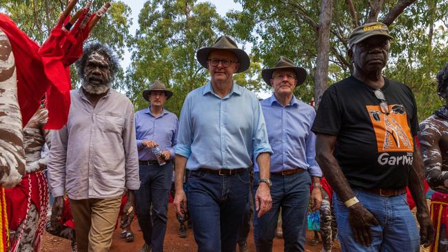 Prime Minister of Australia Anthony Albanese walks with Yolngu community during Garma Festival. Picture: Tamati Smith/Getty Images