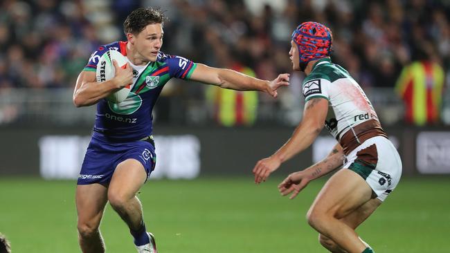 Luke Metcalf fends off Kalyn Ponga. Picture: NRL Photos