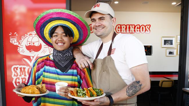 Jeremy Navarro and Shop owner Richard Borg at Smoking Gringos in Blacktown, celebrating Day of the Dead. Picture: Richard Dobson