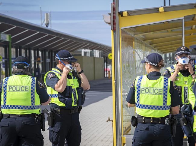 JQ707 arrives at Hobart from Melbourne, police prepare for arrival. Picture Chris Kidd