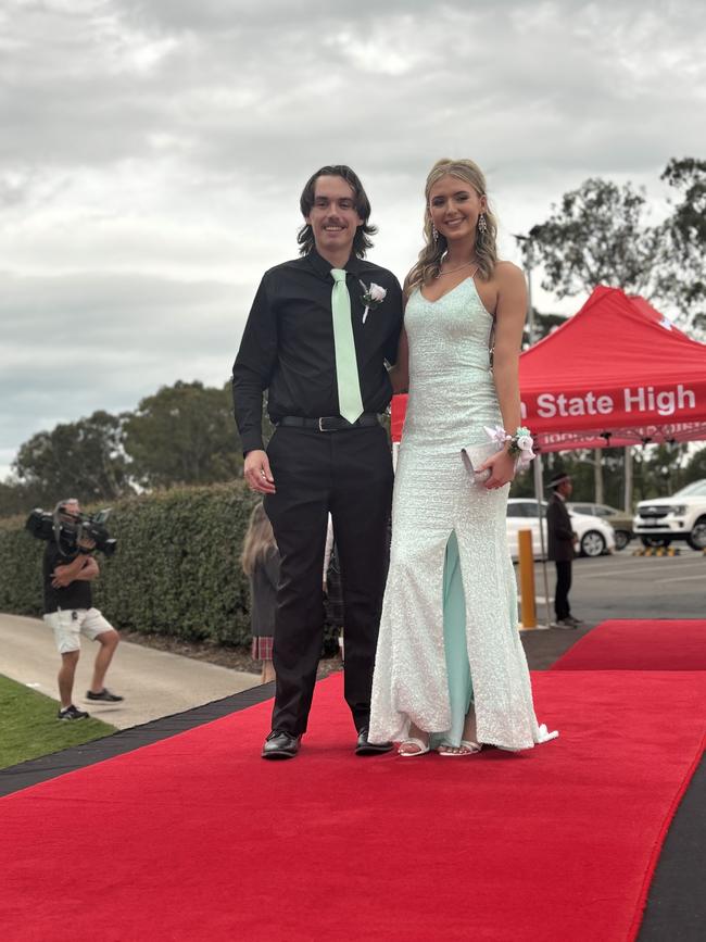 The students of Urangan State High School arriving at their formal.