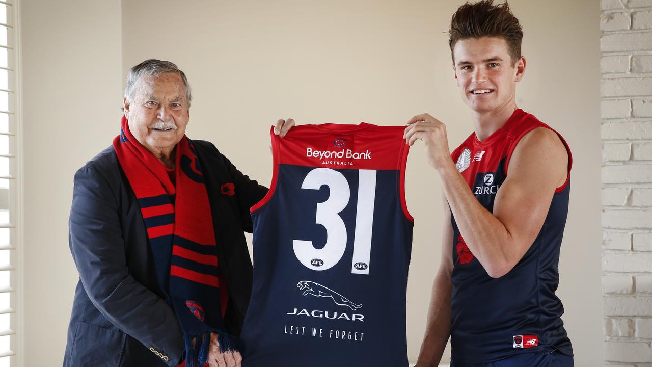 Legend Ron Barassi and Bayley Fritsch with the No.31, which was the number that Ron's father Ron Sr. wore at Melbourne before he went to war. Picture: David Caird