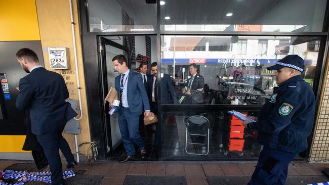 NSW Police detectives at the hairdressing salon after the shooting. Picture: Julian Andrews