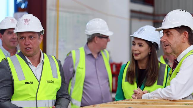 Queensland Premier Steven Miles, Deputy Premier Cameron Dick and Housing Minister Meaghan Scanlon love a good hard hat photo shoot. Picture: NewsWire/Tertius Pickard