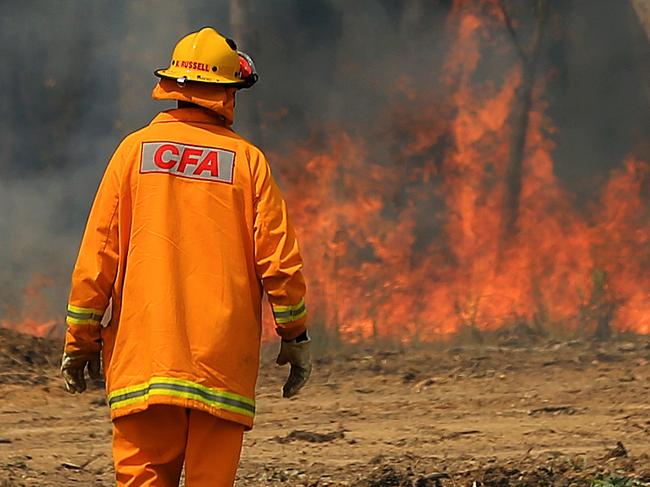 There is an out of control bushfire burning in the Bunyip State Park. CFA crews providing asset protection outside Gembrook. Picture: Mark Stewart