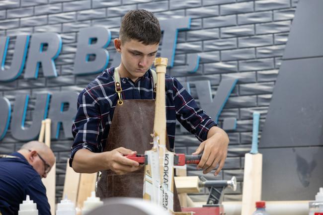 Sunshine Coast cricketer Malakai Pearce in the workshop at Cooper Cricket.