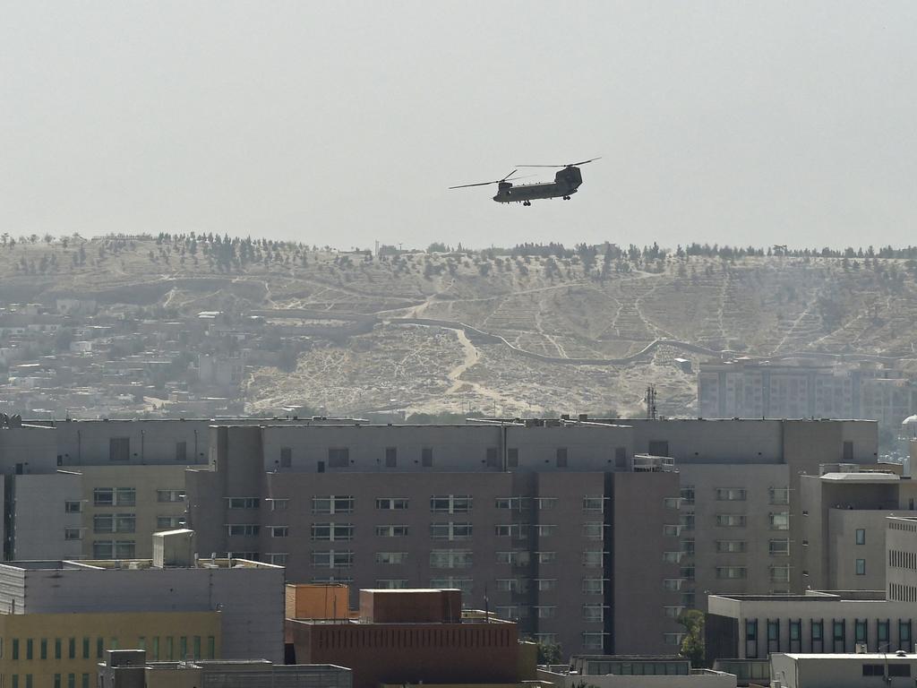 A US military helicopter is pictured flying above of US embassy in Kabul on August 15, 2021. Picture: Wakil Kohsar/AFP