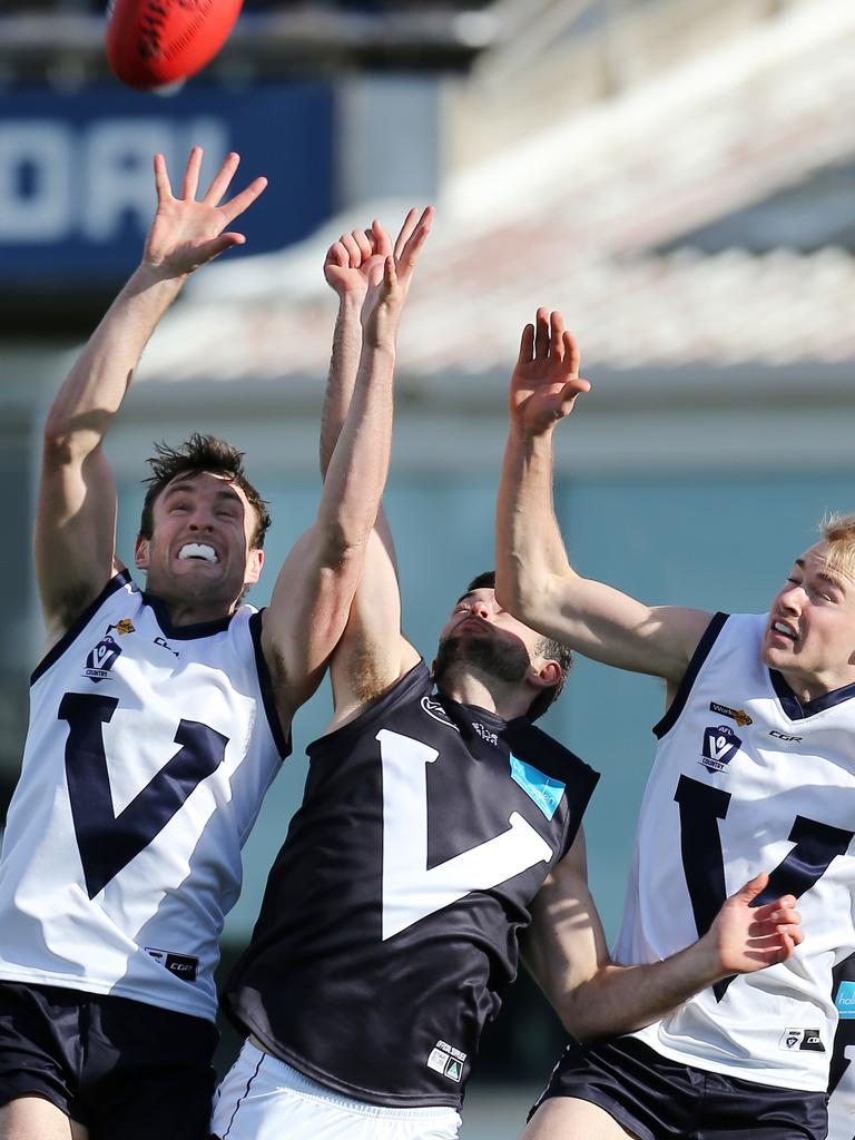 Vic Country’s Sam Dobson and Curtis McCarthy and VAFA’s Elliot Le Grice at Ikon Park, Carlton. Picture: Yuri Kouzmin