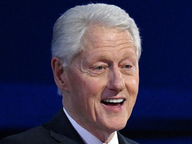 (FILES) Former US President Bill Clinton gestures as he arrives to speak on the third day of the Democratic National Convention (DNC) at the United Center in Chicago, Illinois, on August 21, 2024. Former US President Bill Clinton has been hospitalized with a fever, an aide to the former president announced on December 23, 2024. (Photo by Alex WROBLEWSKI / AFP)