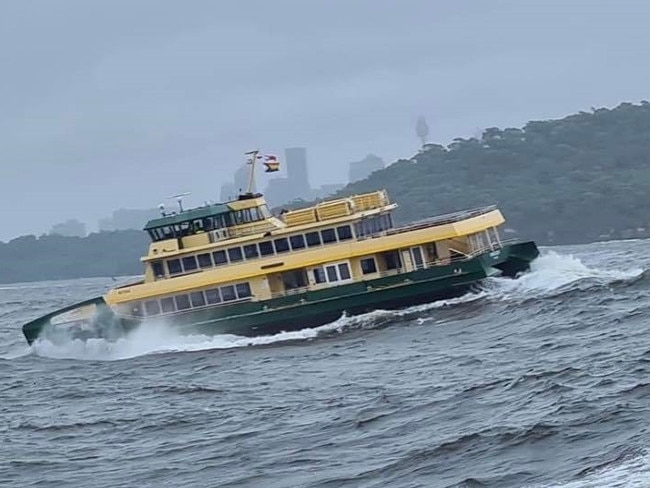 The Fairlight pitches to port as it battles large swells during sea trials near Sydney Heads on Thursday. Picture: Mark Crawley