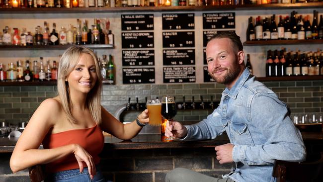 Celia Doyle and Nicolai Henriksen at the bar Odd Culture in Newtown, voted Australia’s best beer venue. Picture: Damian Shaw