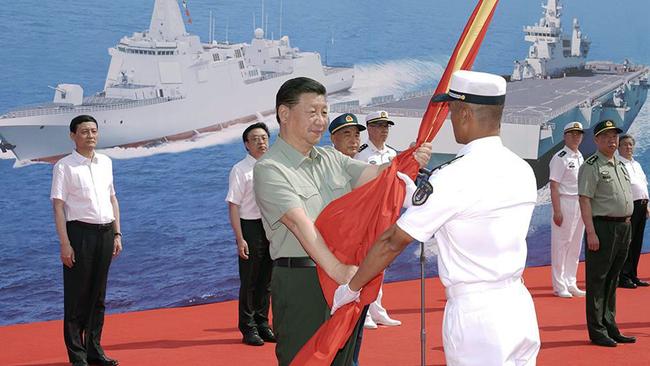 Xi Jinping attends the commissioning ceremony of three naval vessels, the Changzheng-18, the Dalian, and the Hainan. Picture: CGNT.