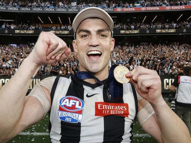 MELBOURNE, AUSTRALIA - SEPTEMBER 30: Brayden Maynard of the Magpies poses with his Premiership Medal after during the 2023 AFL Grand Final match between Collingwood Magpies and Brisbane Lions at Melbourne Cricket Ground, on September 30, 2023, in Melbourne, Australia. (Photo by Darrian Traynor/AFL Photos/via Getty Images)