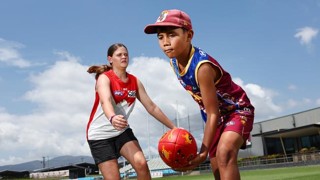 AFL Fans are readying themselves for the biggest weekend of the year, when the Brisbane Lions take on the Sydney Swans in the AFL grand final match at the MCG on Saturday. Poppy Rowden, 12, will be cheering on the Swans, while James Hanlon, 9, will be cheering on his brother-in-law Callum Ah Chee and the Brisbane Lions. Picture: Brendan Radke