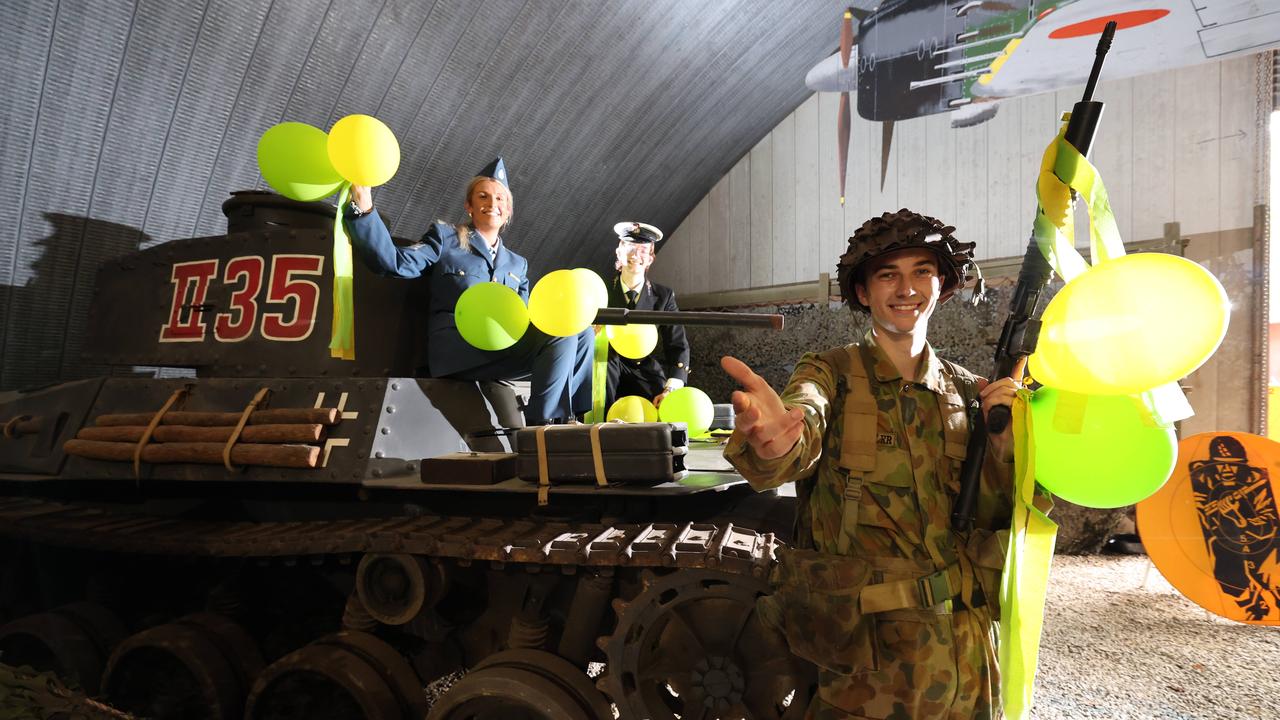 Staff members Balin Biddle, Alicia Withers and Daniel Brodie all dressed up for the Gold Coast War Museum 50th anniversary this Saturday at Mudgeeraba. Picture Glenn Hampson.