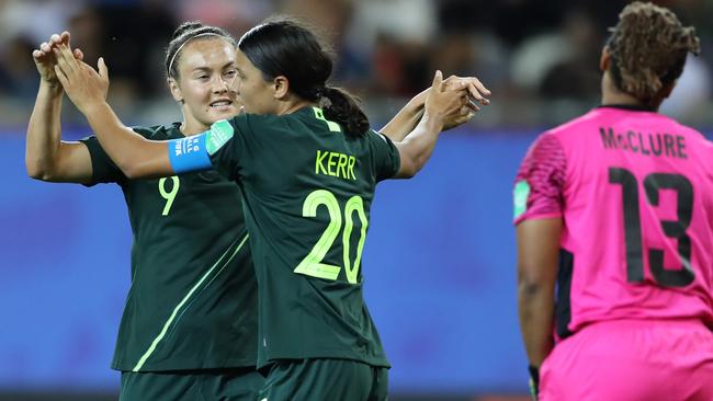 Matildas striker Caitlin Foord congratulates Sam Kerr on her fourth goal against Jamaica. Picture: Getty Images