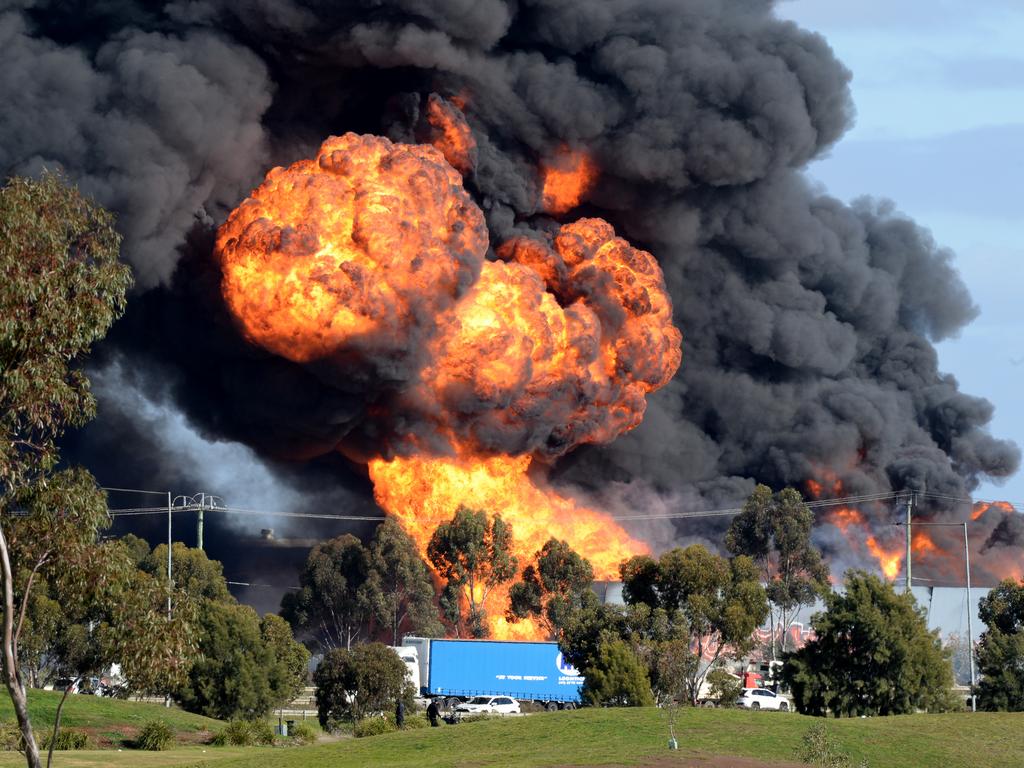 Flames and thick smoke from the Derrimut factory fire. Picture: Andrew Henshaw