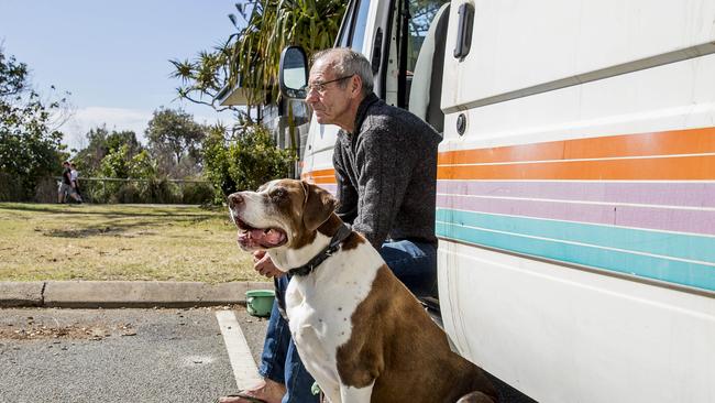 Graeme Aitken lives with his dog Duke in a van at Burleigh Beach. Picture: Jerad Williams