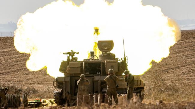 An Israeli army self-propelled howitzer fires rounds near the border with Gaza in southern Israel on October 11, 2023. Picture: Jack Guez/AFP