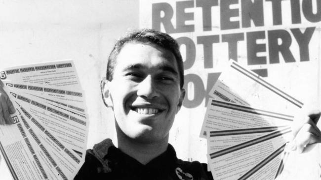 West Adelaide footballer David Twomey holding SANFL Player Retention Lottery tickets in 1988. Picture: Ray Titus