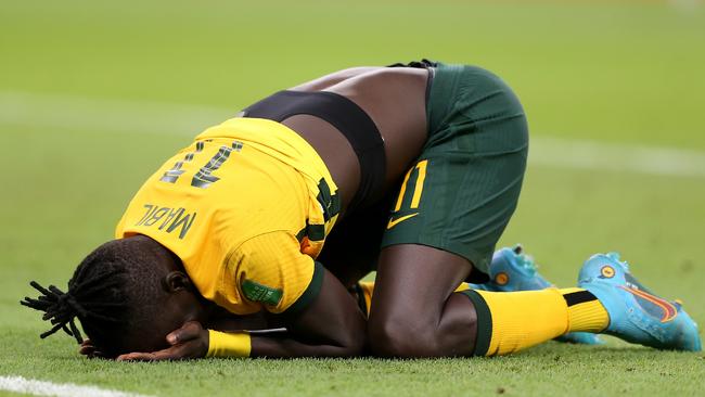 Awer Mabil is overcome by emotion after Australia’s win.