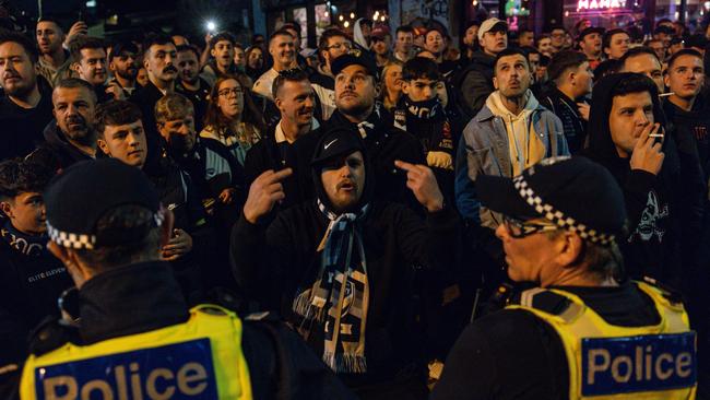 Tensions boiled over between fans and the police. Picture: NewsWire / Diego Fedele