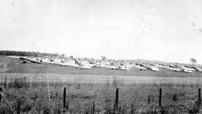 STRENGTH IN NUMBERS: Hundreds of Spitfire fighter aircraft from the Royal Australian Air Force line up at the Oakey base during World War II.