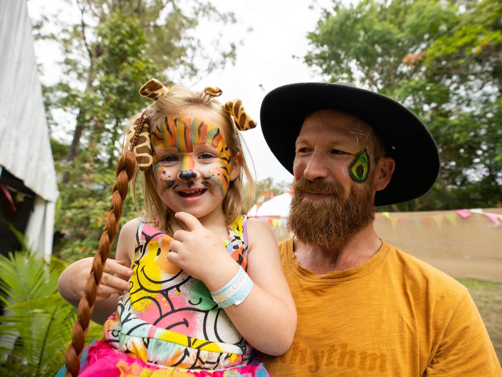 Todd Brown with daughter Melaleuca 3, on day one of the Woodford Folk Festival. Picture: Lachie Millard