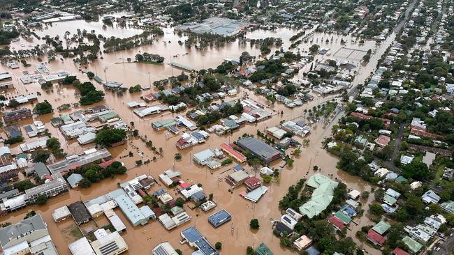 TOPSHOT - A handout photo taken and received on March 31, 2022 from the New South Wales (NSW) State Emergency Service shows floodwaters inundating the northern NSW city of Lismore. (Photo by Handout / NEW SOUTH WALES STATE EMERGENCY SERVICE / AFP) / ----EDITORS NOTE ----RESTRICTED TO EDITORIAL USE MANDATORY CREDIT " AFP PHOTO / NEW SOUTH WALES STATE EMERGENCY SERVICE" NO MARKETING NO ADVERTISING CAMPAIGNS - DISTRIBUTED AS A SERVICE TO CLIENTS