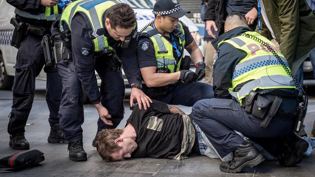 The bungling suspect’s escape plan was foiled as he ran straight into the Victoria Police Centre. Picture: Jake Nowakowski