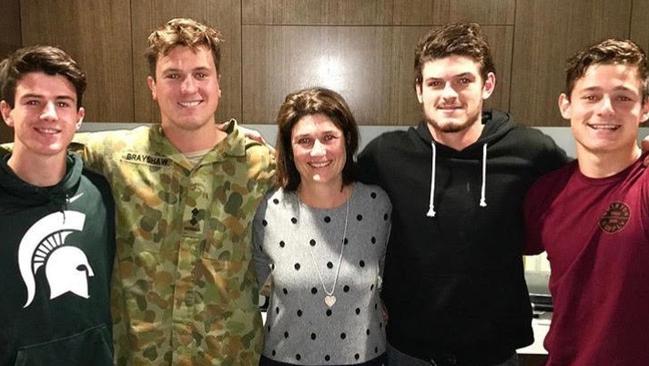 Andrew with army lieutenant brother Will, mum Deborah, Demon Angus and Hamish.