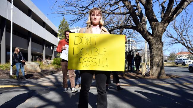 University students protest against Education Minister Dan Tehan at the National Press Club on Friday June 19 when he launched the funding package.