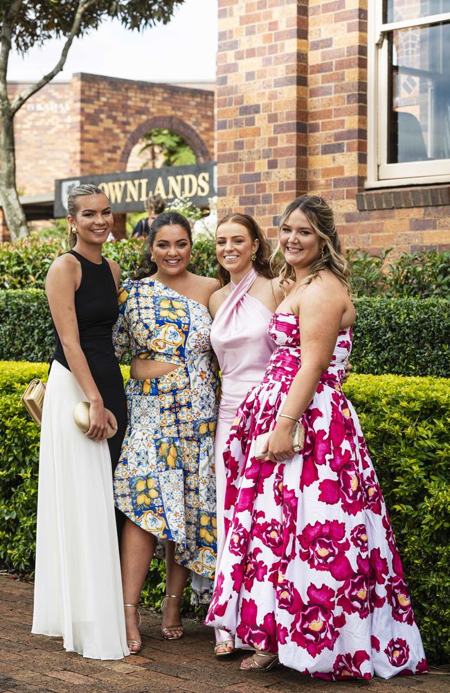 Graduates (from left) Meg Combarngo, Nina McAndrew, Libby White and Eden Fechner as Downlands College year 12 students come together for their valedictory mass at the college, Saturday, November 16, 2024. Picture: Kevin Farmer