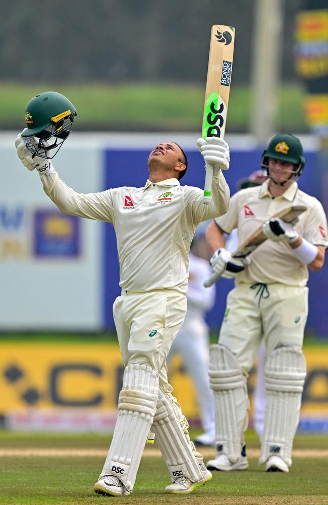 Australia's Usman Khawaja celebrates after scoring a century. Picture: AFP