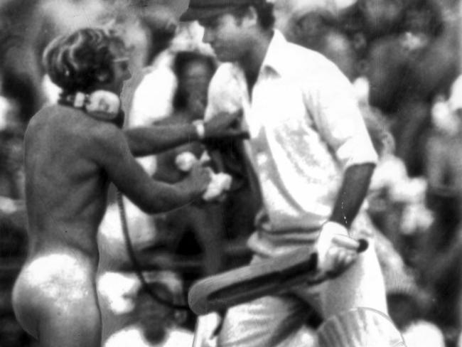 Greg Chappell pictured with a streaker moments before the very public spanking.