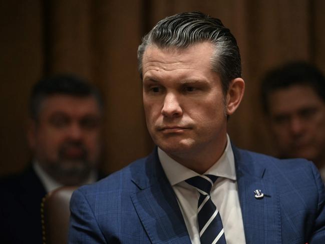 US Secretary of Defense Pete Hegseth looks on as US President Donald Trump holds a cabinet meeting at the White House in Washington, DC, on February 26, 2025. (Photo by Jim WATSON / AFP)