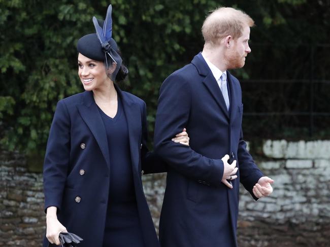 The newlyweds were greeted by royal watchers outside church on Christmas. Picture: AP Photo/Frank Augstein