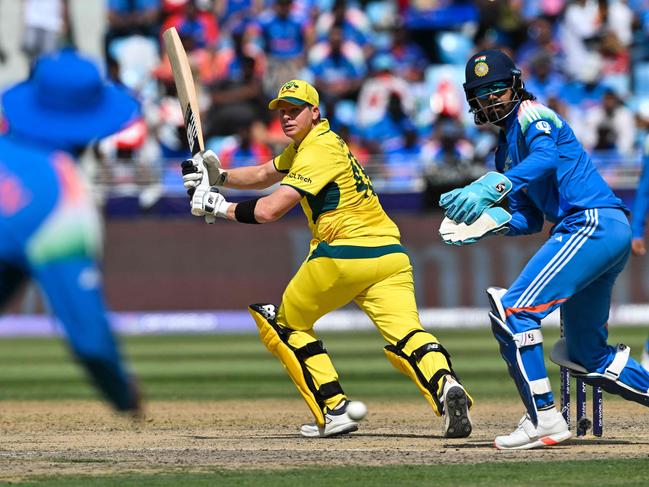 Australia's captain Steve Smith plays a shot during the Champions Trophy semi final. Picture: AFP