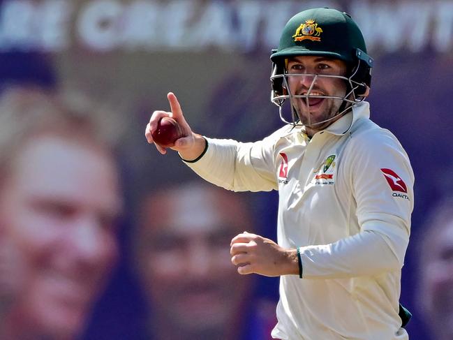 Australia's Josh Inglis takes a catch to dismiss Sri Lanka's Nishan Peiris during the fourth day of the first Test cricket match between Sri Lanka and Australia at the Galle International Cricket Stadium in Galle on February 1, 2025. (Photo by Ishara S. KODIKARA / AFP)