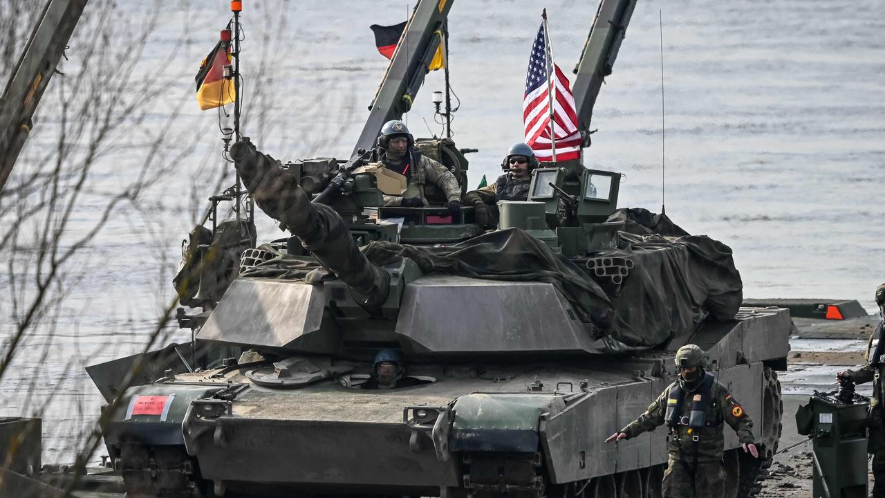 US soldiers on an Abrams tank and German soldiers take part in the NATO DRAGON-24 military exercise in Korzeniewo, northern Poland, March 4, 2024. Picture: Wojtek Radwanski / AFP