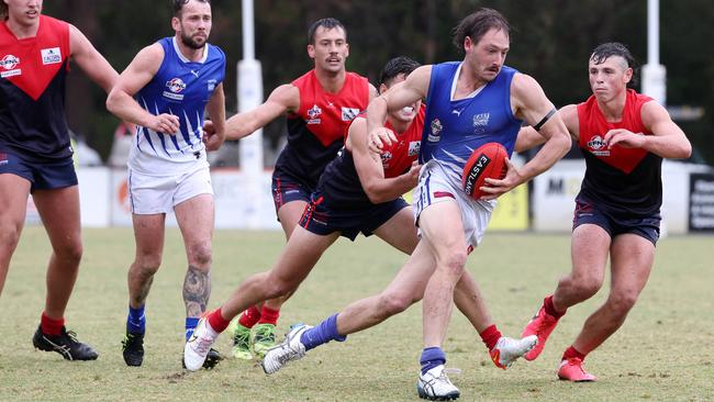 The ‘Roos make it two from two this season against the Dees. James Belo pictured in action earlier this season. Picture: George Sal