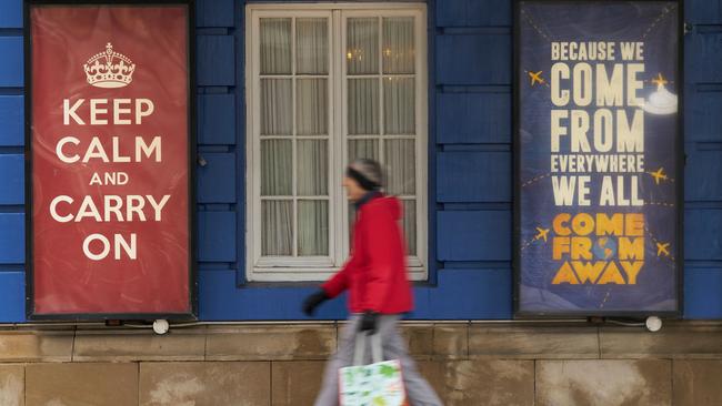 A woman walks past the Royal Alexandra Theatre in Toronto, Ontario in the early days of the pandemic. Picture: AFP