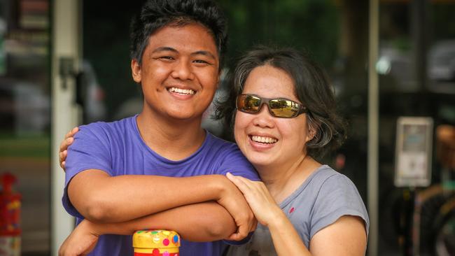 Peter Susanto with mum Lenny. Picture: Glenn Campbell