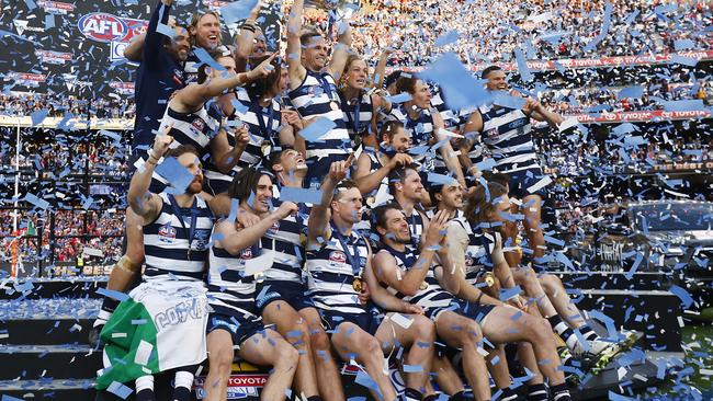 The Cats celebrate winning the 2022 AFL Grand Final match between the Geelong Cats and the Sydney Swans at the Melbourne Cricket Ground on September 24, 2022 in Melbourne, Australia. (Photo by Daniel Pockett/AFL Photos/via Getty Images)